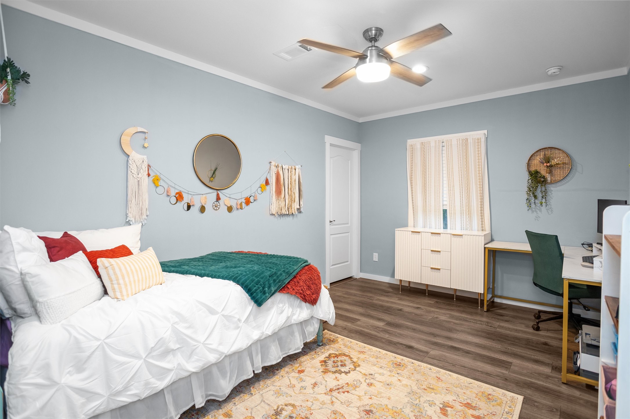 275 County Road 3215 Colmesneil, TX 75938 - Photo 27 of 34 a bed room with a bed and a chandelier