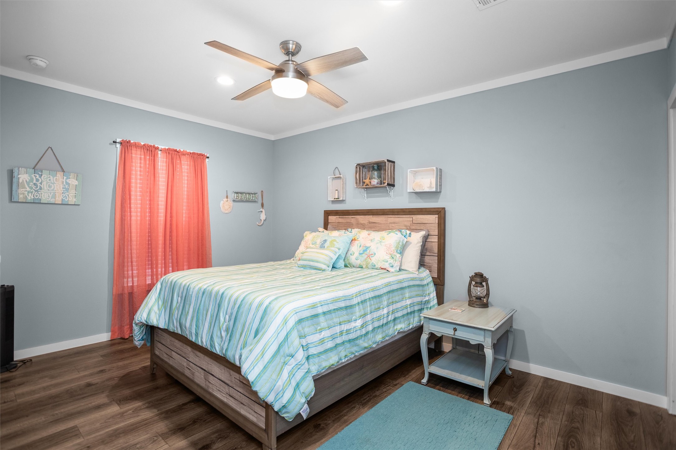 275 County Road 3215 Colmesneil, TX 75938 - Photo 31 of 34 a bedroom with a bed and a chandelier