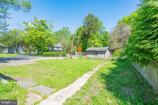a view of a garden with a bench