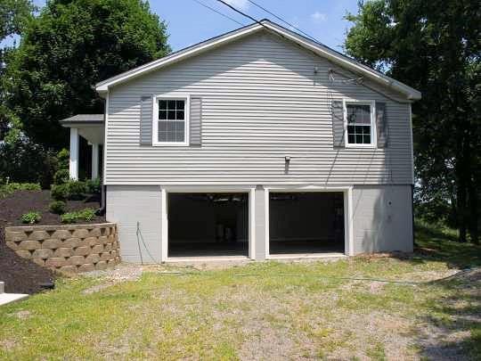 3472 Nonaville Road Mount Juliet, TN 37122 - Photo 14 of 20 Attached 2 car garage with access to the house through the basement level bonus room! Garage has two separate insulated doors, additional room for a workbench area, and houses the new water heater and new electrical panel.