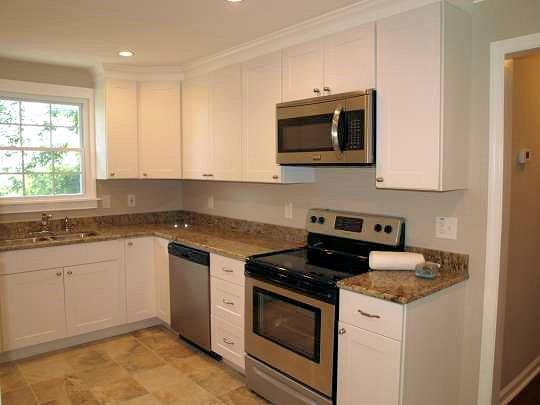 Views of Old Hickory Lake out the Kitchen window!   Ample new cabinetry, gorgeous granite counter tops, porcelain tile floors, stainless Frigidaire appliances (Dishwasher, Range, & Microwave), & opens to spacious 355 sq ft living room with Oak floors