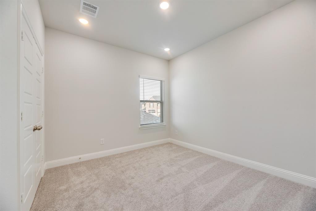 7009 Sunset Boulevard Rowlett, TX 75088 - Photo 25 of 35 an empty room with a window