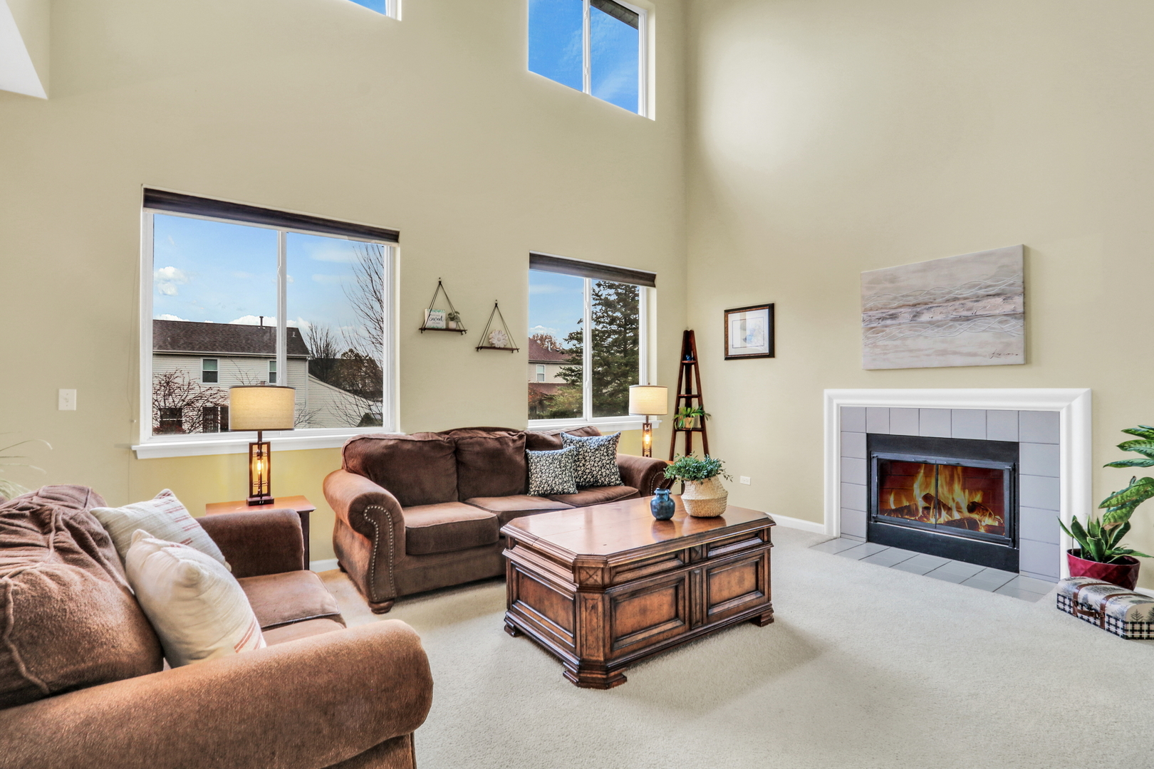 77 Bridle Path Drive Lindenhurst, IL 60046 - Photo 21 of 52 a living room with furniture and a fireplace