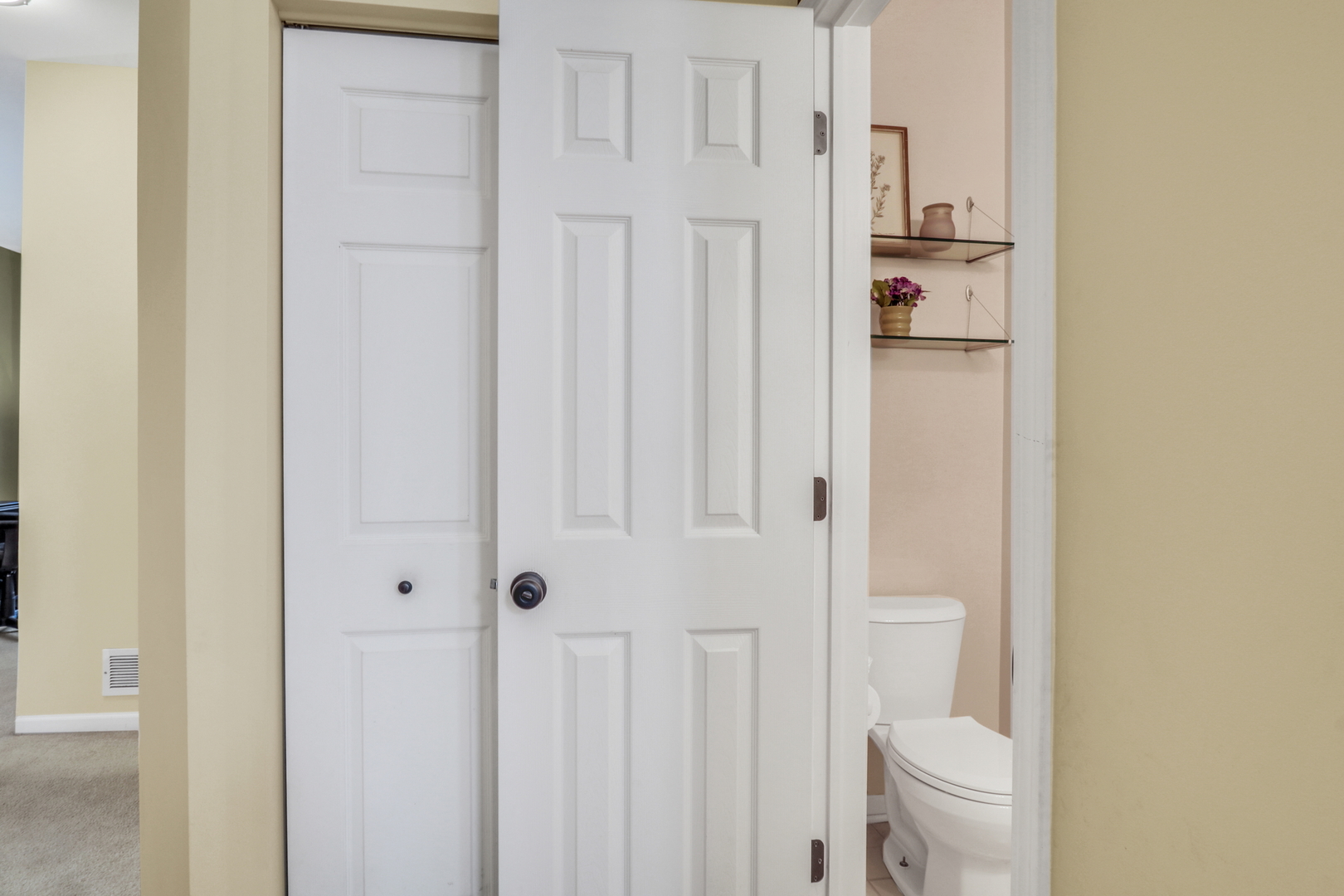 77 Bridle Path Drive Lindenhurst, IL 60046 - Photo 25 of 52 a bathroom with a toilet and a shower