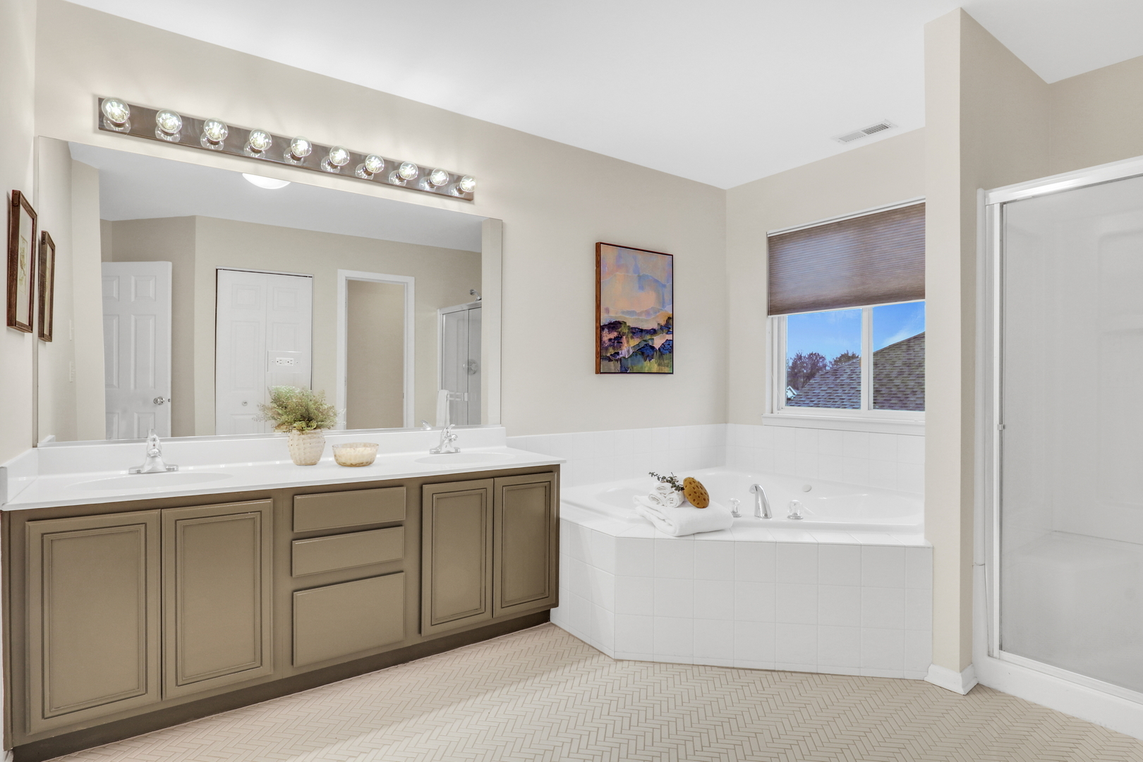 77 Bridle Path Drive Lindenhurst, IL 60046 - Photo 32 of 52 a bathroom with a tub a sink and mirror