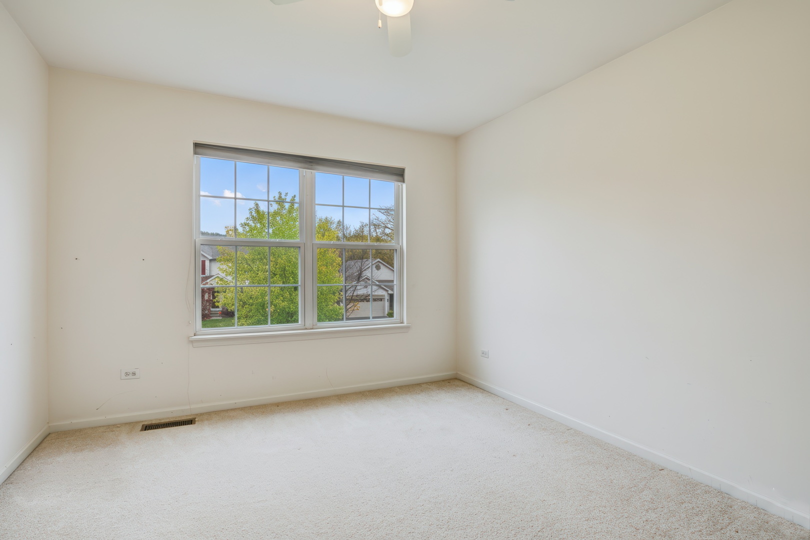77 Bridle Path Drive Lindenhurst, IL 60046 - Photo 35 of 52 an empty room with a window