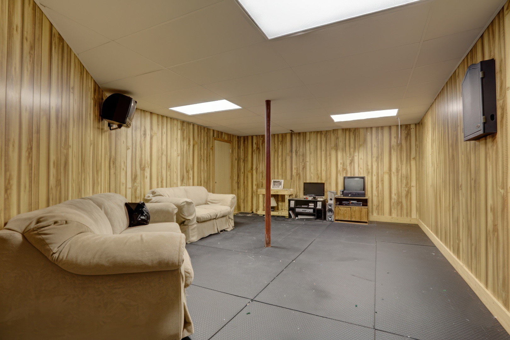 77 Bridle Path Drive Lindenhurst, IL 60046 - Photo 40 of 52 a living room with furniture and large window