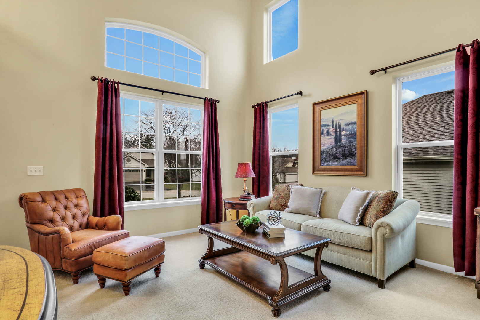 77 Bridle Path Drive Lindenhurst, IL 60046 - Photo 6 of 52 a living room with furniture and a large window