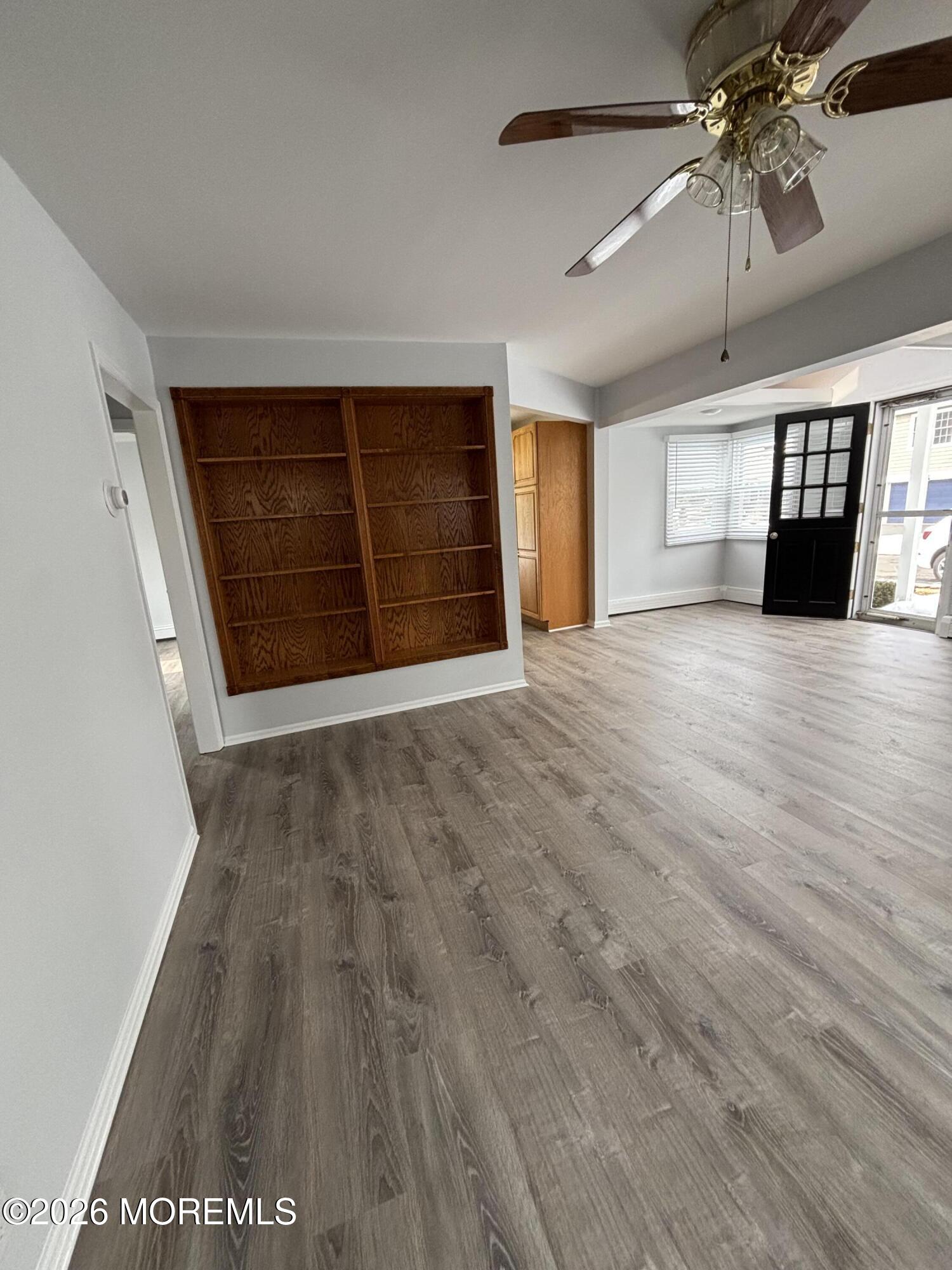 507 Riverside Drive South Brick, NJ 08723 - Photo 11 of 17 wooden floor in an empty room with a window