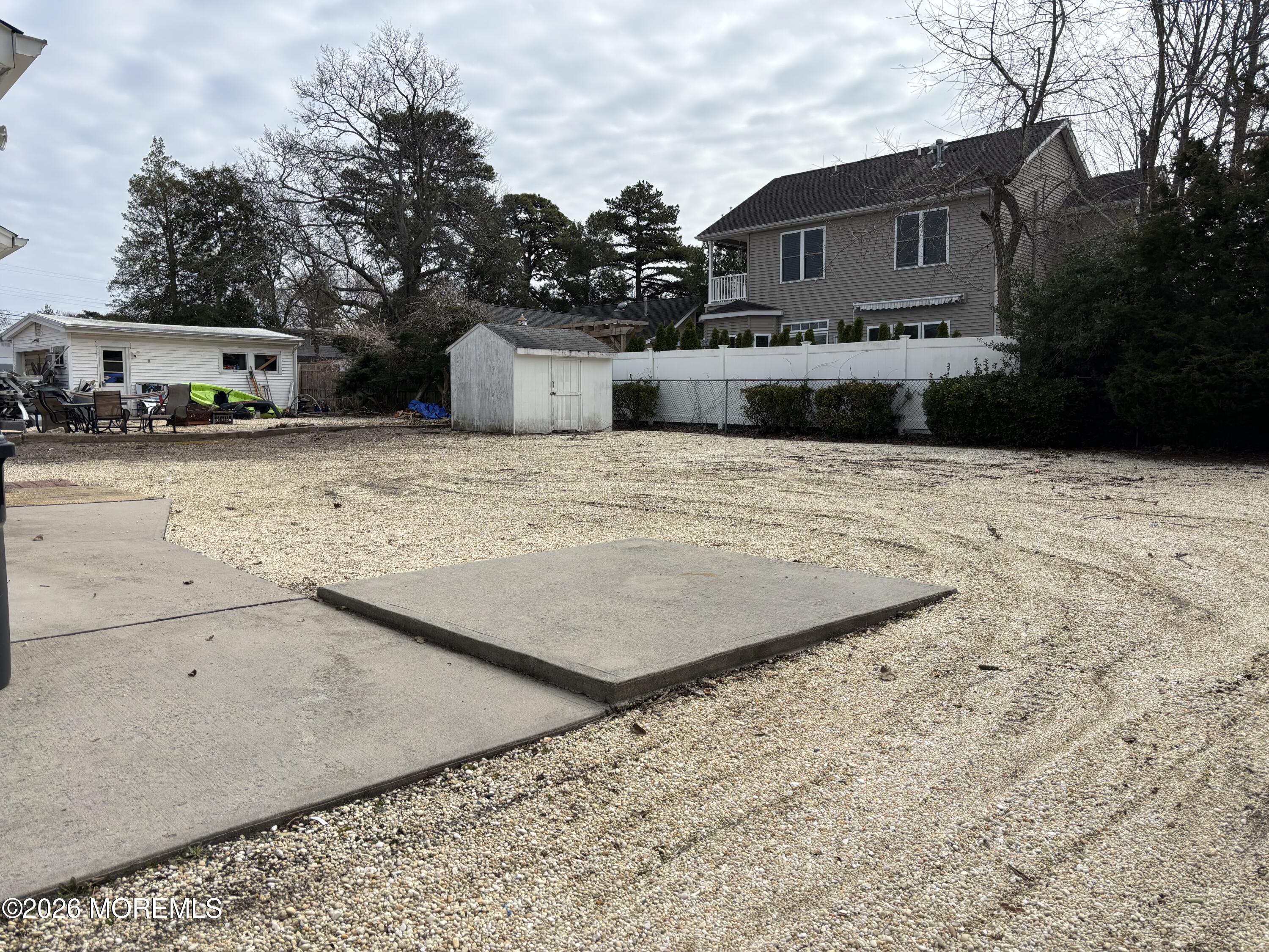 507 Riverside Drive South Brick, NJ 08723 - Photo 5 of 17 a front view of a house with a yard
