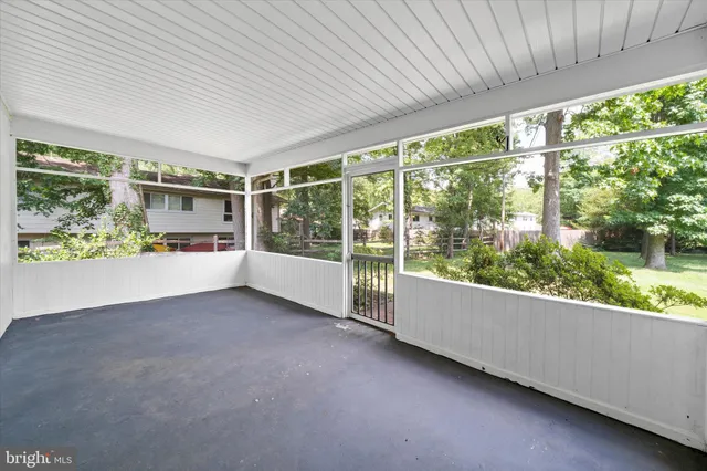 a living room with large windows