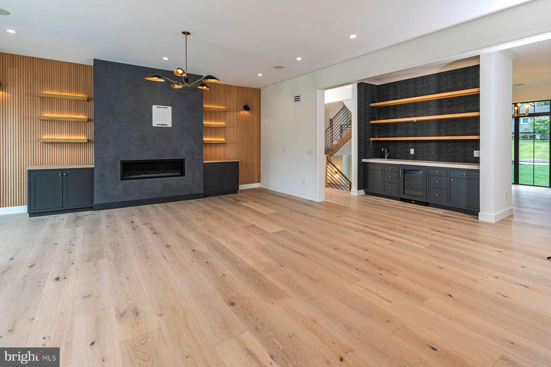 109 Poe Road Princeton, NJ 08540 - Photo 18 of 62 Great Room Fireplace and Wet Bar