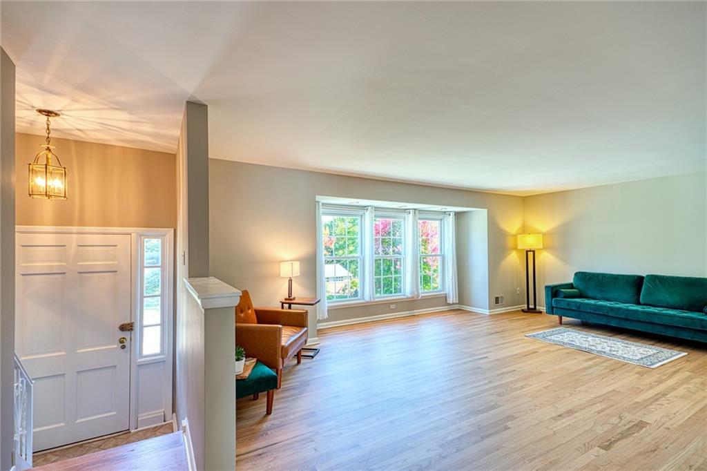 1608 Seegar Road Pittsburgh, PA 15241 - Photo 4 of 24 a living room with furniture and a large window