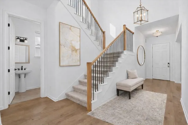 a view of a hallway with seating area