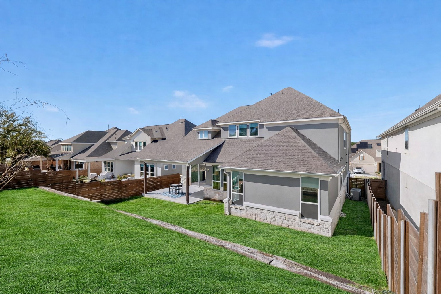 7705 Alouette Drive Austin, TX 78738 - Photo 31 of 40 a aerial view of a house with a yard table and chairs
