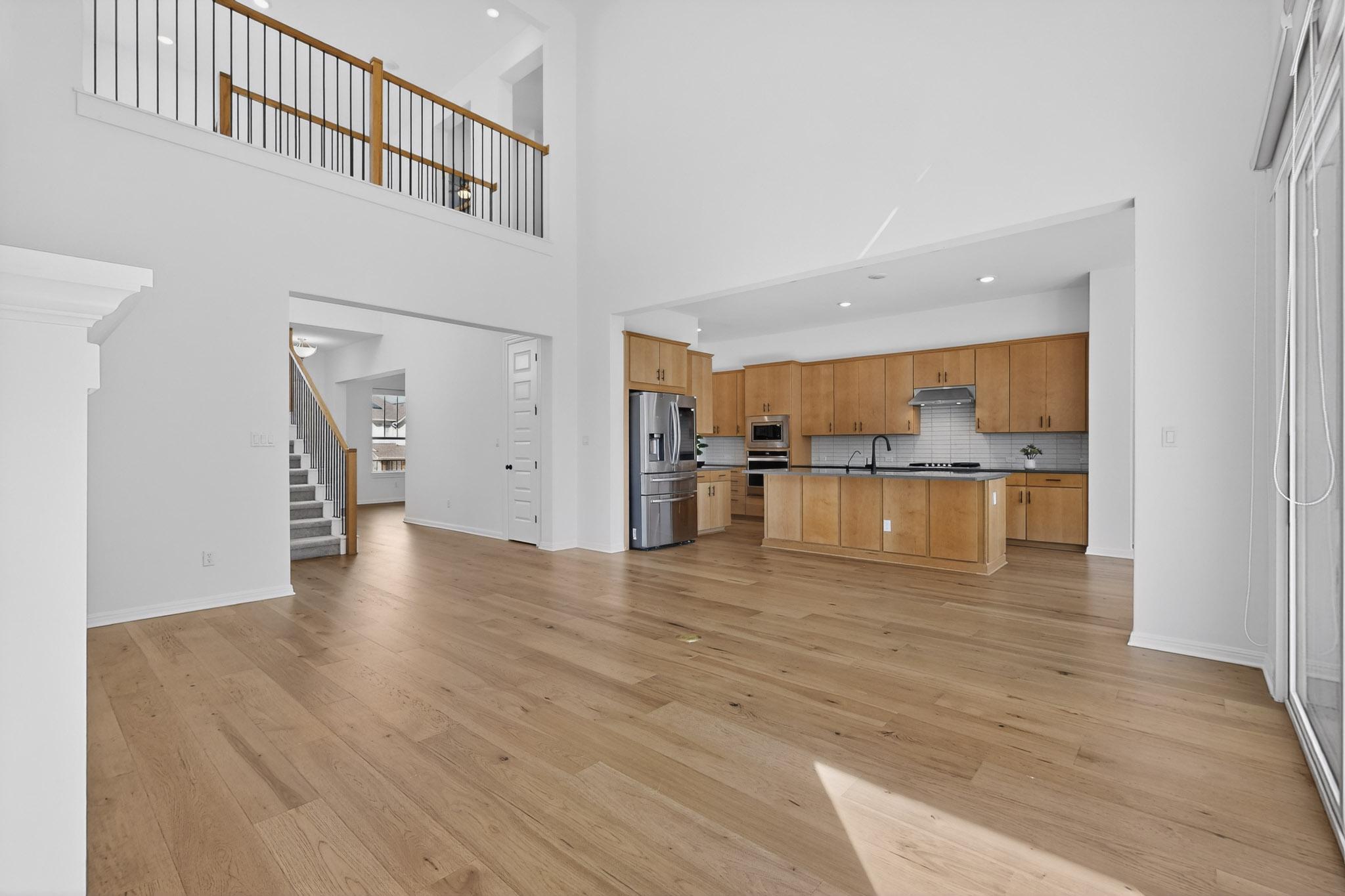 7705 Alouette Drive Austin, TX 78738 - Photo 9 of 40 a view of a kitchen with a sink and an oven