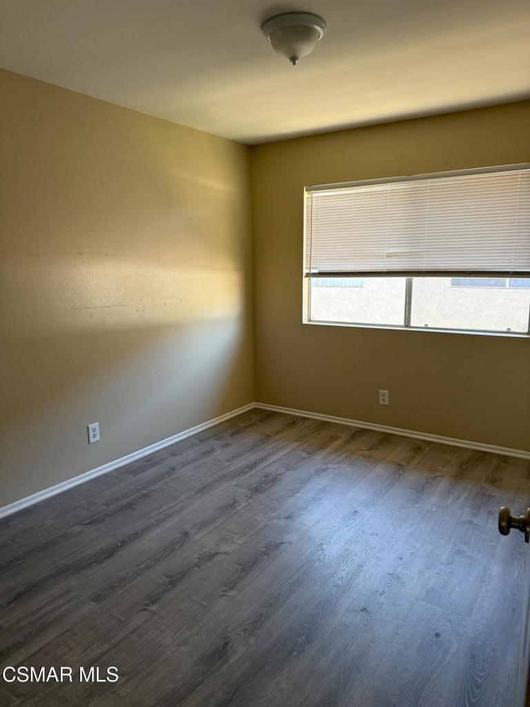 2014 Avenida Placida, Unit 4 Simi Valley, CA 93063 - Photo 7 of 12 an empty room with a window