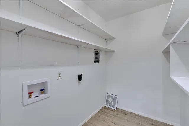 a view of a hallway with closet