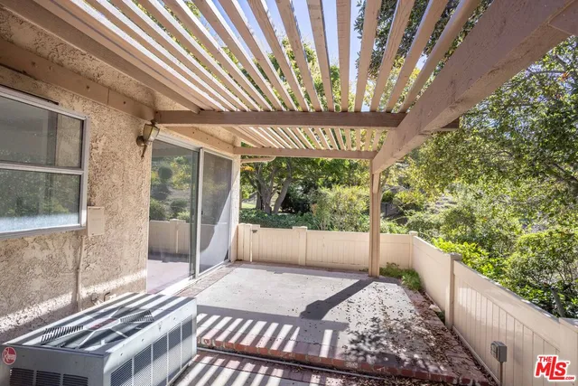 an aerial view of residential house and sandy dunes