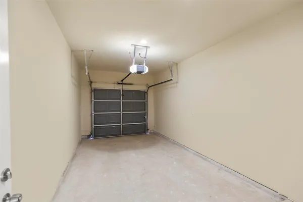 an empty room with a fireplace