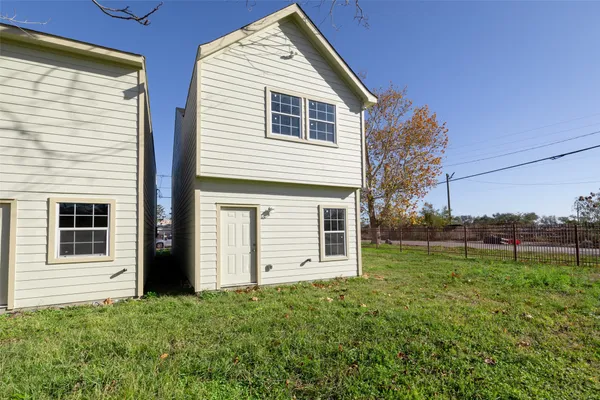 a view front of house with backyard