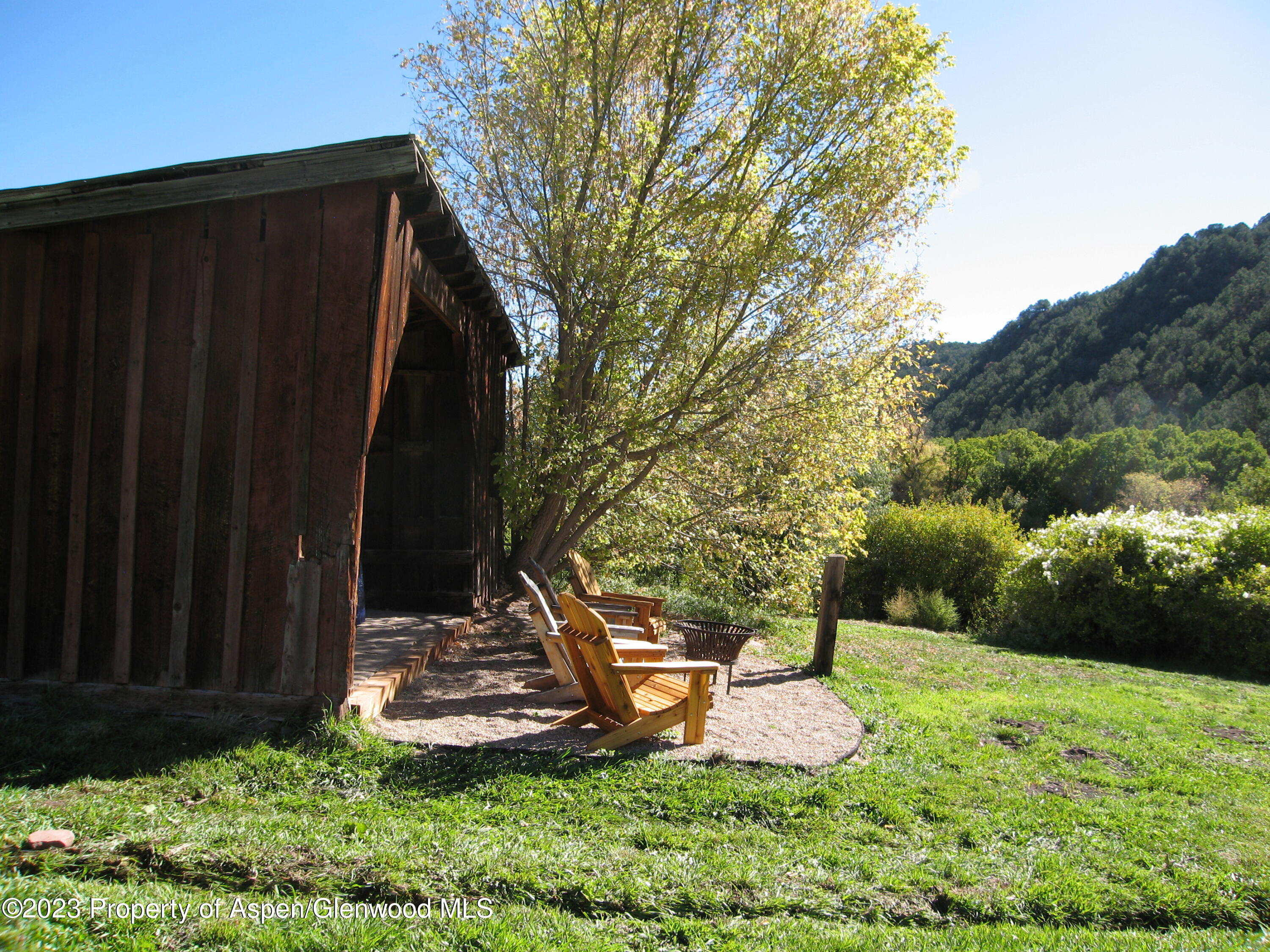 3044 Cattle Creek Road Carbondale, CO 81623 - Photo 17 of 20 Lean to with Chairs