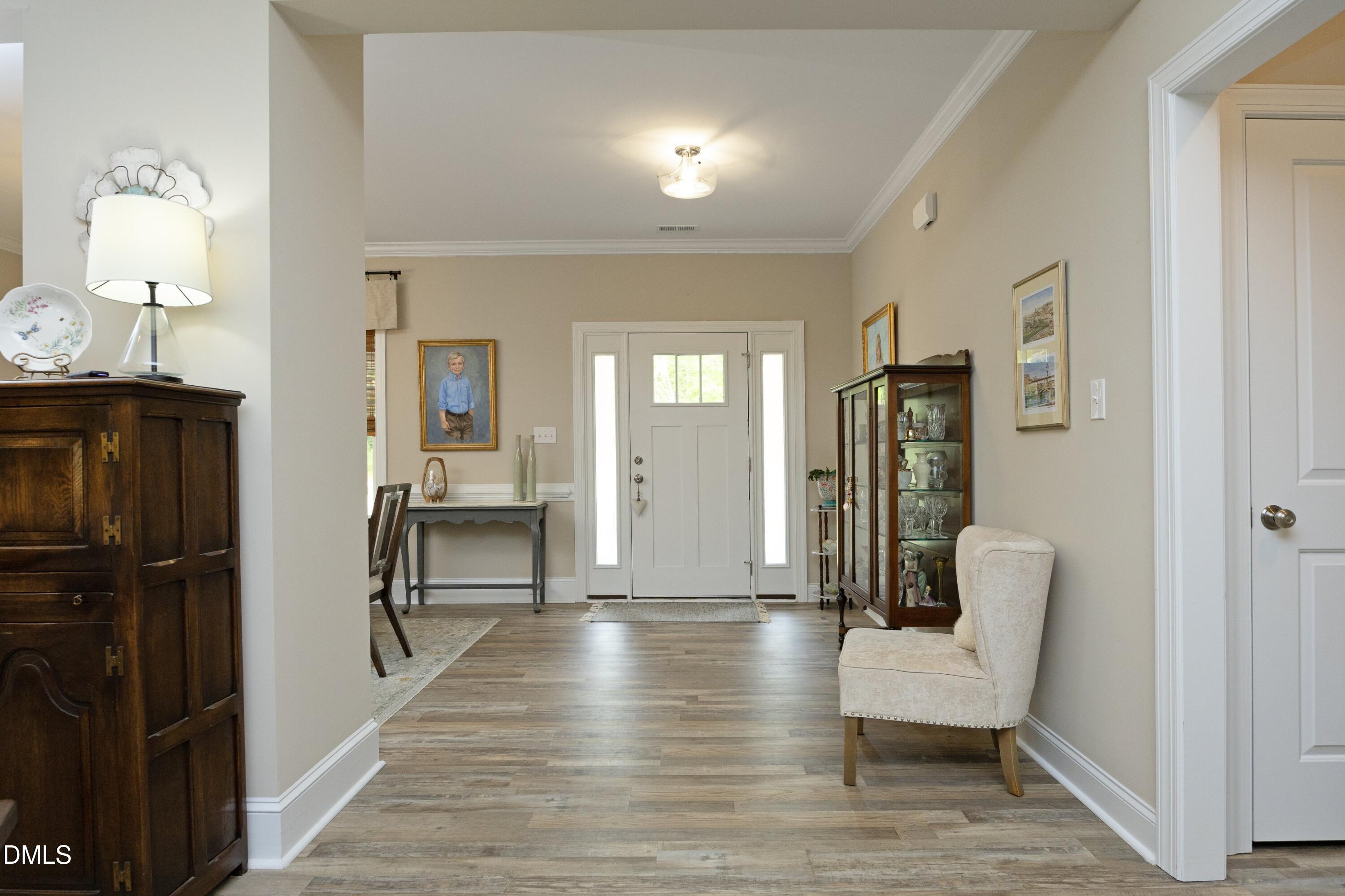 114 Colson Ridge Drive Clayton, NC 27520 - Photo 4 of 57 06FoyerFromLiving