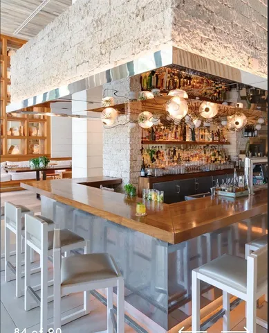 a view of a chairs and table in the terrace