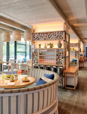 a view of a living room and dining room