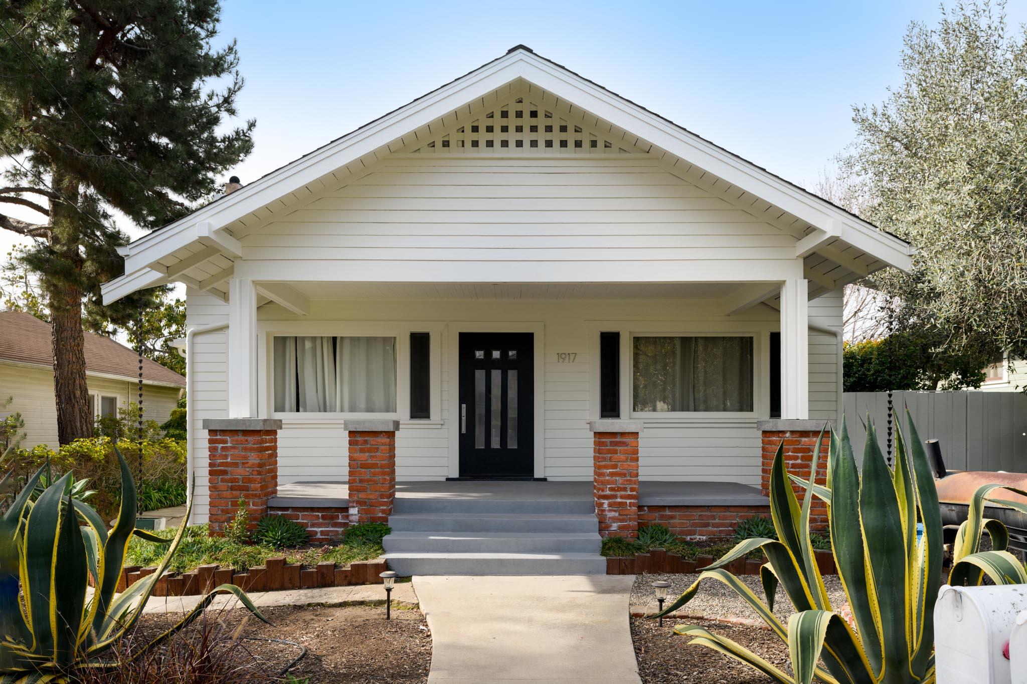 1917 Bath Street Santa Barbara, CA 93101 - Photo 1 of 22 a front view of a house with garden
