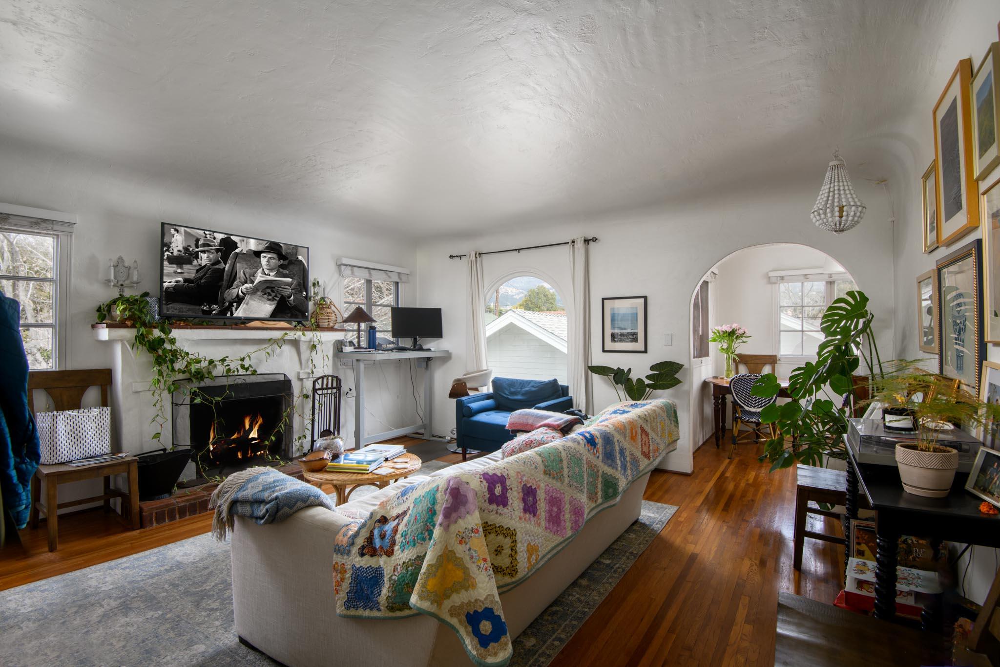 1917 Bath Street Santa Barbara, CA 93101 - Photo 17 of 22 a living room with fireplace furniture and a fireplace