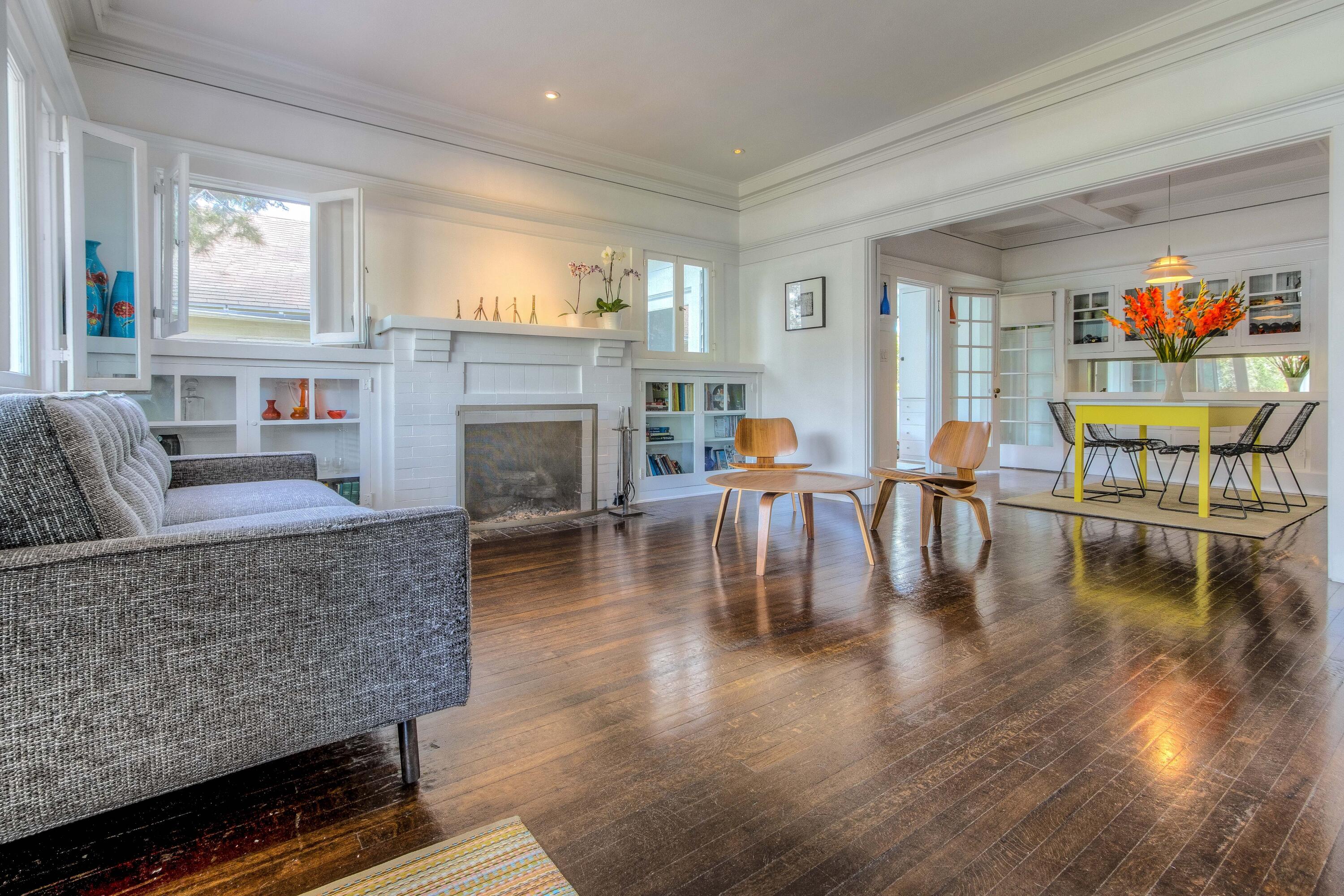 1917 Bath Street Santa Barbara, CA 93101 - Photo 3 of 22 a living room with fireplace furniture and a wooden floor