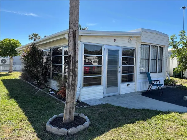 a front view of house with yard