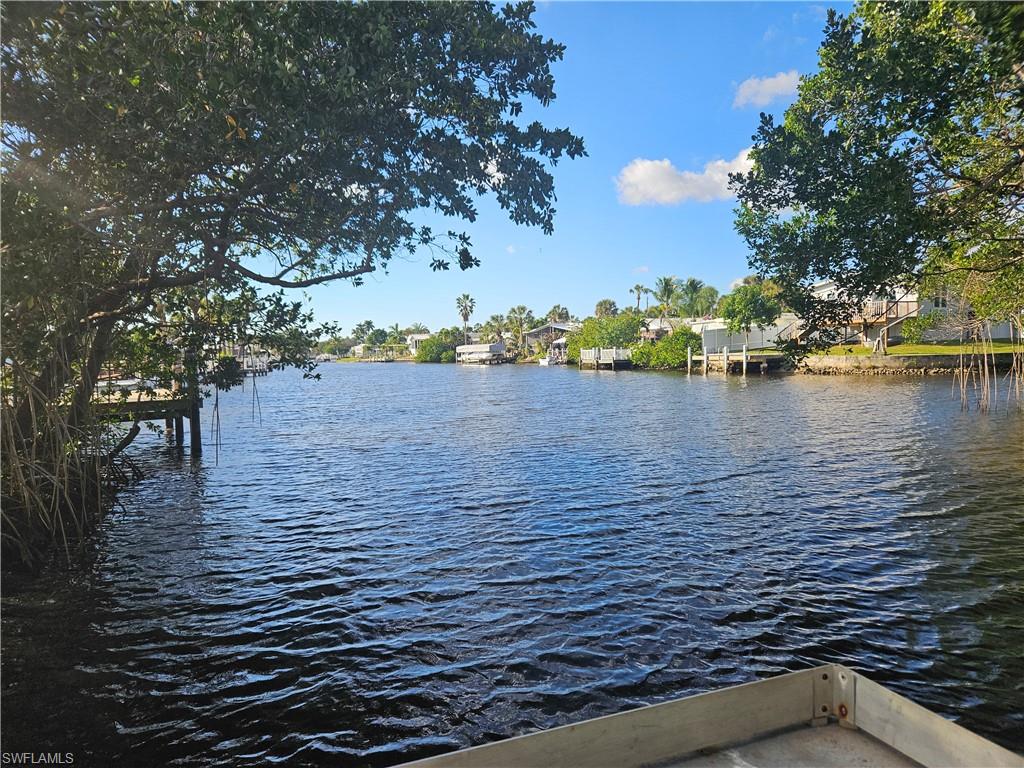 9 Jade Drive, Unit 9J Naples, FL 34114 - Photo 25 of 28 a view of lake