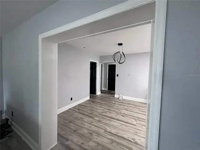 a view of a room with an entryway