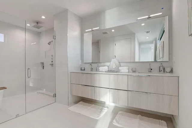 a white bath tub sitting in a bathroom