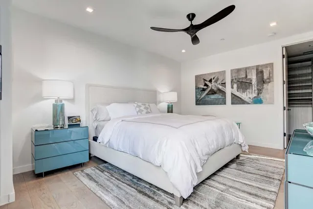 a kitchen with a refrigerator and a sink