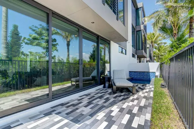 a view of a kitchen with shelves