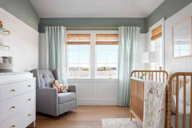 a living room with furniture and windows