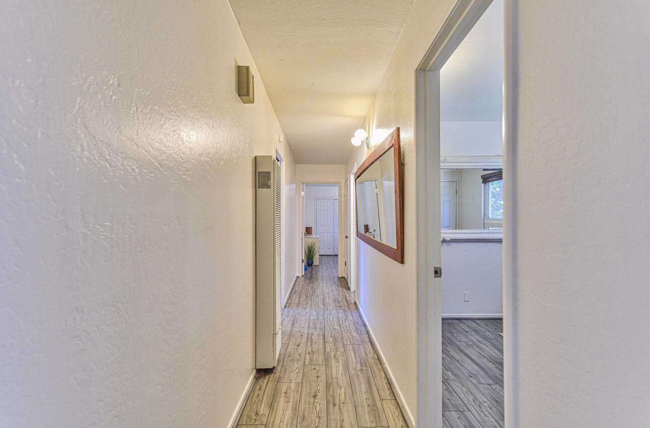 26 Young Drive Salinas, CA 93901 - Photo 14 of 28 a view of a hallway with wooden floor