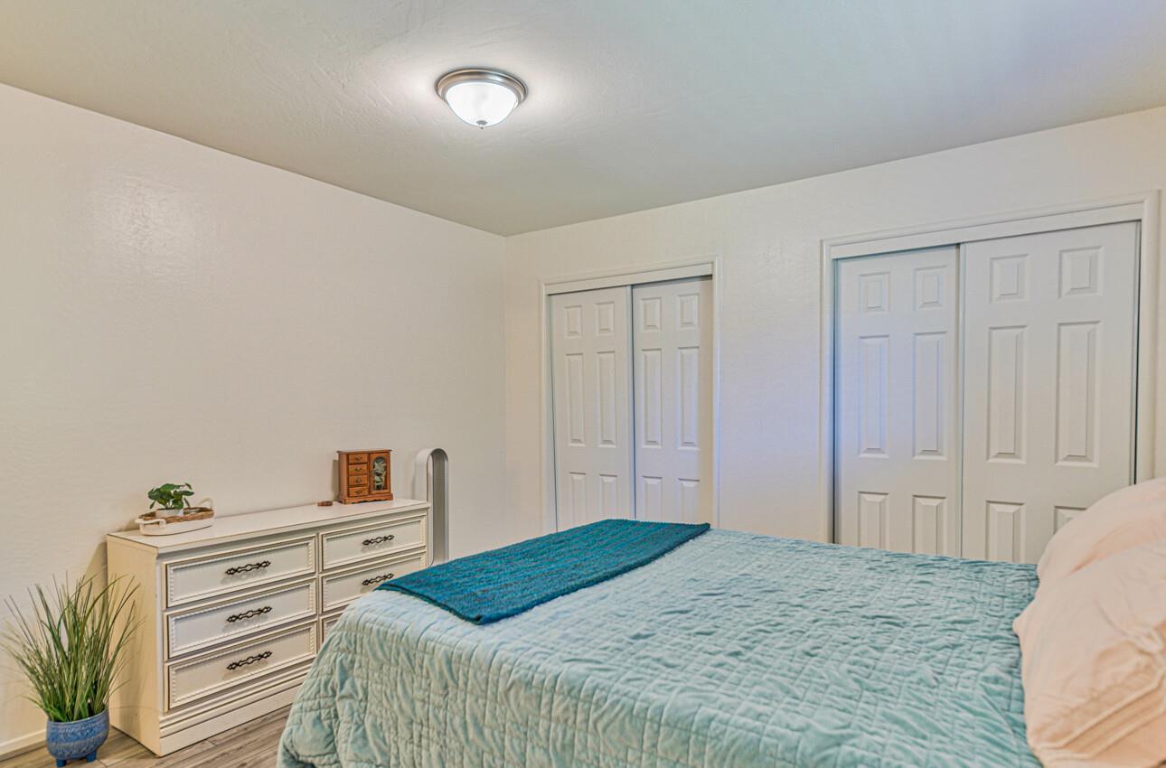 26 Young Drive Salinas, CA 93901 - Photo 17 of 28 a bedroom with a bed and a desk