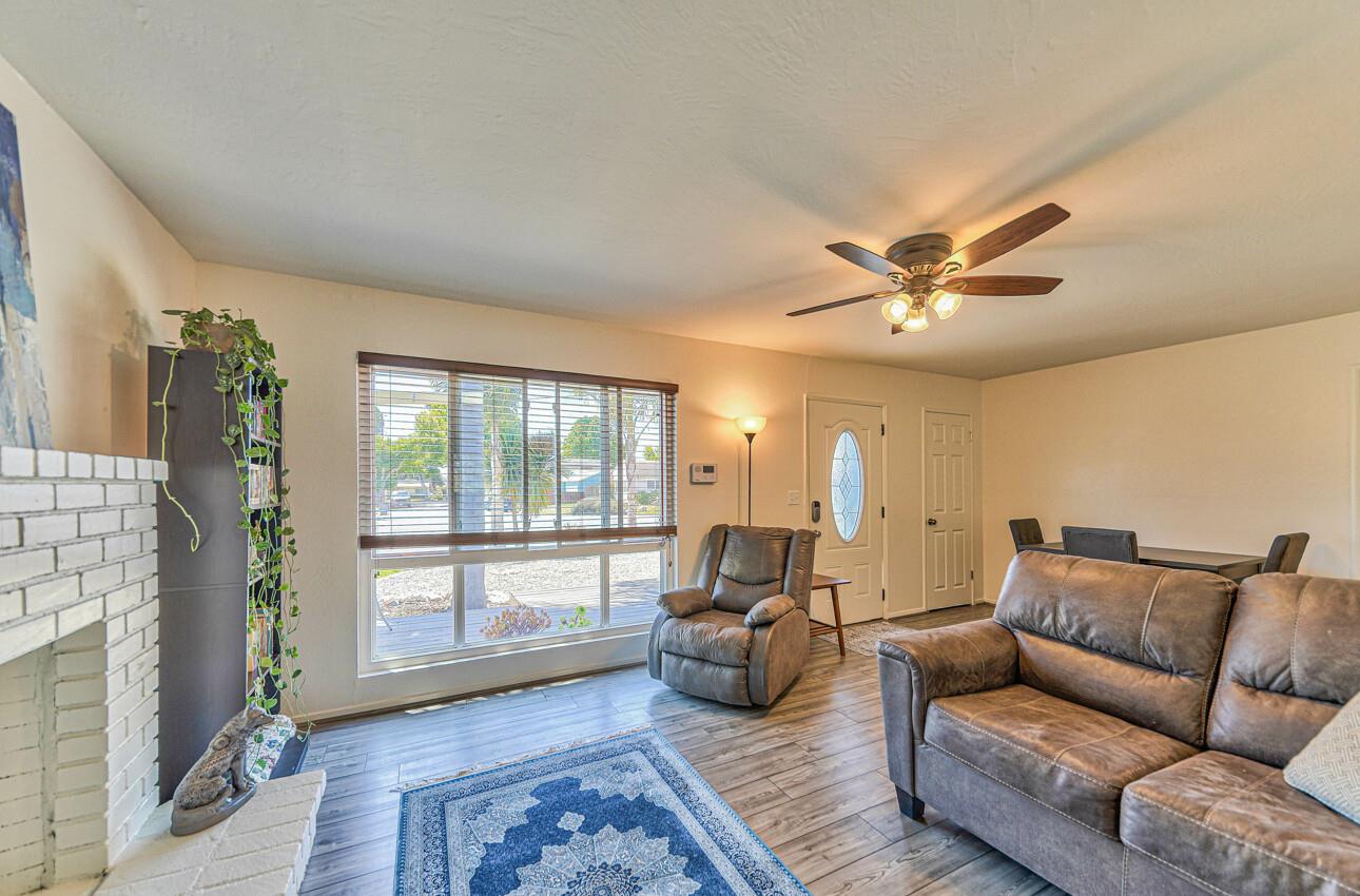26 Young Drive Salinas, CA 93901 - Photo 8 of 28 a living room with furniture and a large window