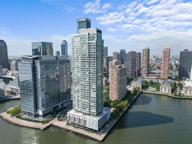 a view of a city with tall buildings