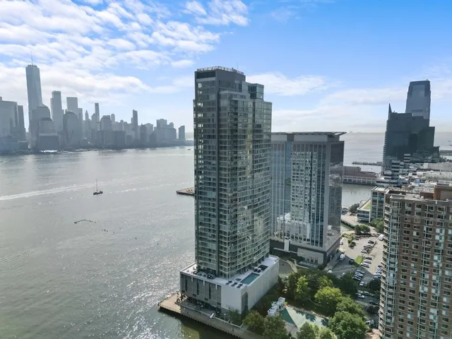 a view of a city with tall buildings