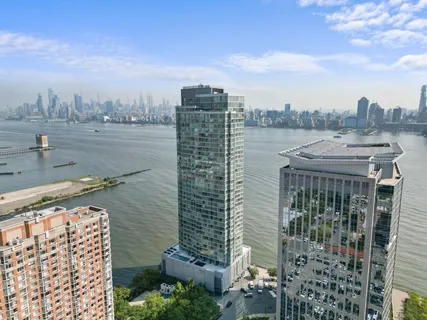 a view of a city with tall buildings