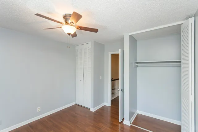 a view of a livingroom with wooden floor
