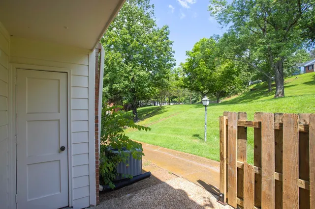 a view of a porch with a yard