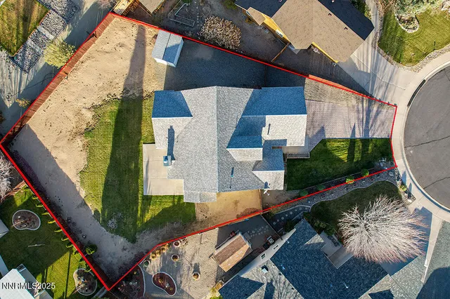 an aerial view of a house having patio