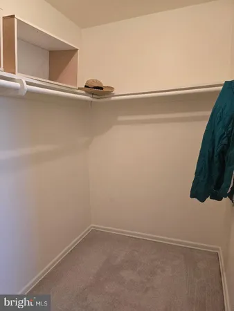 a view of small space with racks on the wall