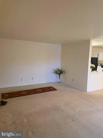 a view of a room with an empty space